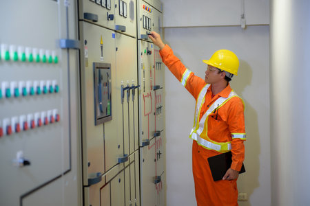 electrical engineer using tablet checking and serviceの写真素材