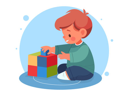 A boy is playing with toy blocks.のイラスト素材