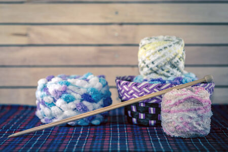 Knitting yarn balls and needles.