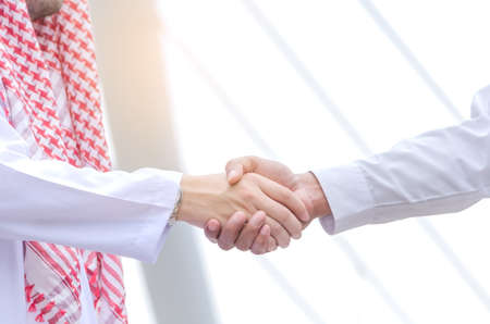 Close-up image of a firm handshake standing for a trusted partnership,international.