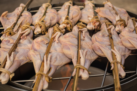 marinated chicken on grillの写真素材