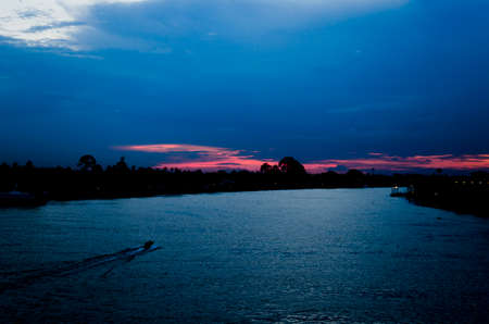 sundown on the riverの写真素材