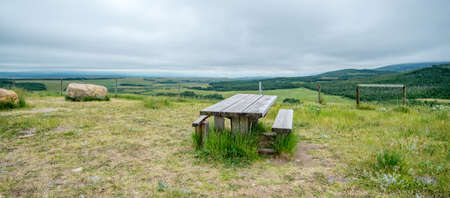 Landscape of nature with green trees, mountains and sky in the backgroundの写真素材