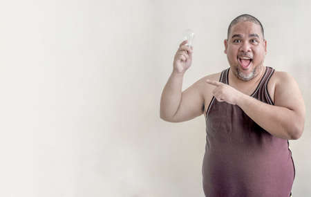 a man with a light bulbの写真素材