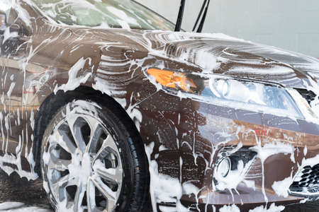 car wash with lot of soap and foamの写真素材