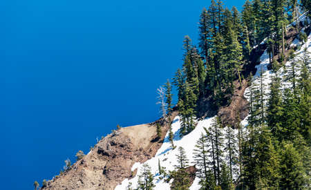 Crater Lake, with snow top mountain and clear blue lake