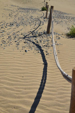 Rope in sandの写真素材