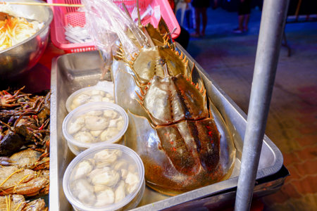 Horseshoe crabs are sold at street food stalls in Thailand. It is popular to burn and eat its eggs.の写真素材
