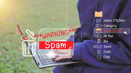 The concept of e-mail and computer viruses. Review the concepts of internet security, spam and e-marketing on screen. Spam email pop-up warnings.の写真素材