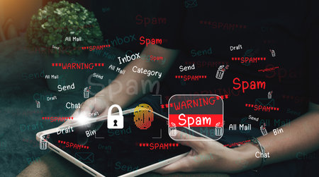 The concept of e-mail and computer viruses. Review the concepts of internet security, spam and e-marketing on screen. Spam email pop-up warnings.の写真素材