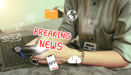 Online breaking news concept. hand holding smartphone using to watch around the globe news and daily updates on web page screens. Flat design of smartphone usability.