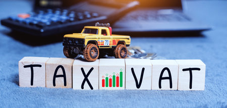 The Concept of taxes for car on block cubes paid by individuals and corporations such as VAT, income tax and property tax Data analysis, paperwork,Financial research.