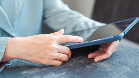 Woman typing work on laptop Suitable for making infographics.