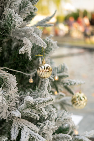 close up of balls on christmas tree on blurred background. New Year concept.の写真素材