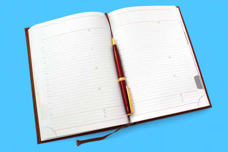 Opened everyday notebook with ballpen isolated on cyan background