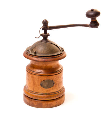 Old wooden coffee-grinder isolated on white backgroundの写真素材