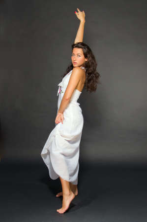 Dancing young dark haired beautiful woman. Gypsy, spanish styleの写真素材