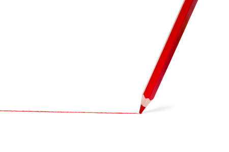 Red line drawing pencil on white paperの写真素材