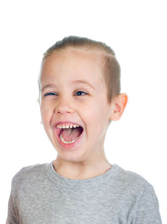 Young laughing caucasian boy isolated on white background