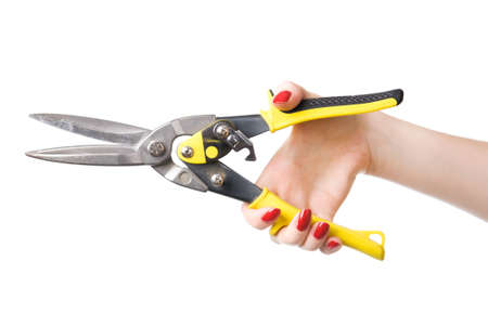 Woman hand with heavy scissors for metal. Isolated on white.の写真素材