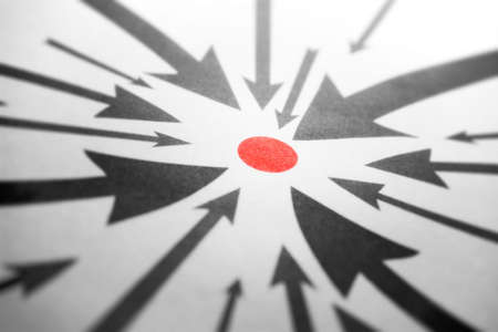 Arrows pointing to one red point. Perspective view.の写真素材