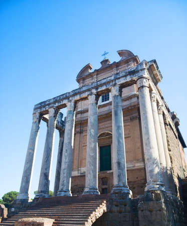 Ancient building on Rome Forum. On blue sky background.の写真素材