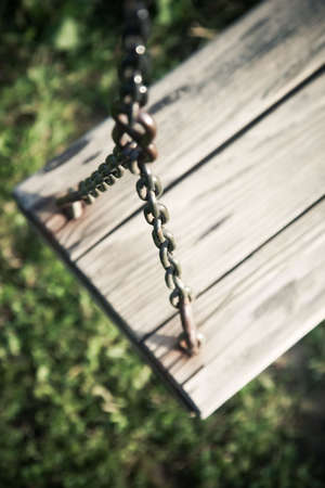 Swing. Focus on chain. Contrast colors.の写真素材