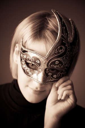 Young woman with mask portrait. Sepia color.の写真素材