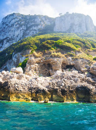 Tropical island with rocky shore.の写真素材