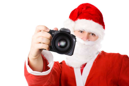Santa Claus with modern digital camera. Isolated on white.の写真素材