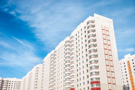 Modern buildings on blue sky background.の写真素材