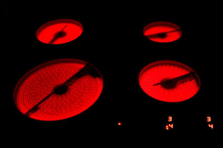 Electric oven. Dark night photo.の写真素材