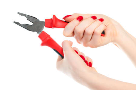 Woman hand with pliers. Isolated on white.
