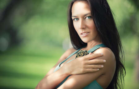 Young woman outdoors portrait. Soft colors.の写真素材