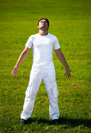 Young man delighting good weather.