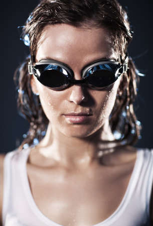 Young woman swimmer portrait. Water studioの写真素材