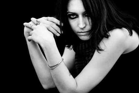 Goth woman portrait. Dark contrast black and white colors.の写真素材