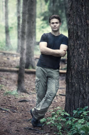 Young calm man in forest.の写真素材