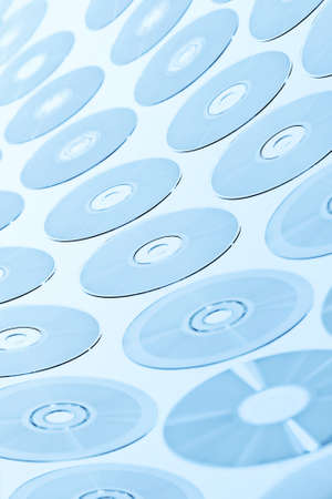 CD disks background. Blue tint.の写真素材