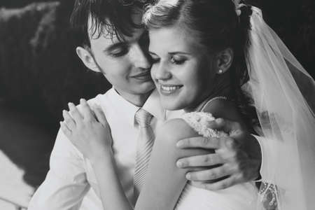 Young wedding couple portrait. Black and white retro style colors.の写真素材