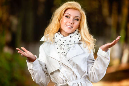 Young smiling woman autumn portrait.の写真素材