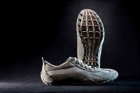 Boots for active recreation. On black background.
