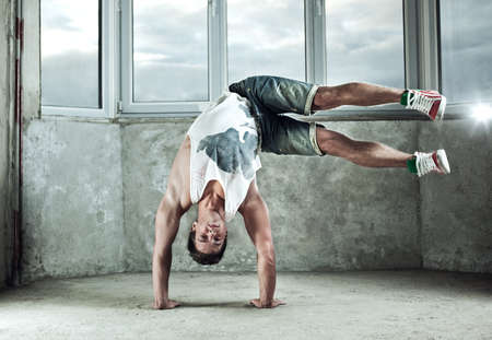 Young strong man break dance.の写真素材