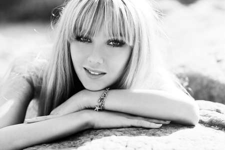 Young woman outdoors portrait. Black and white.の写真素材