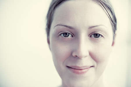 Young woman portrait. Soft yellow tint.