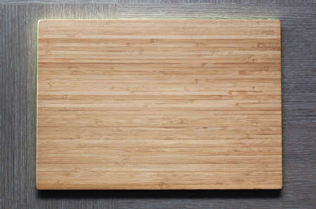 New wooden plate with empty textspace.