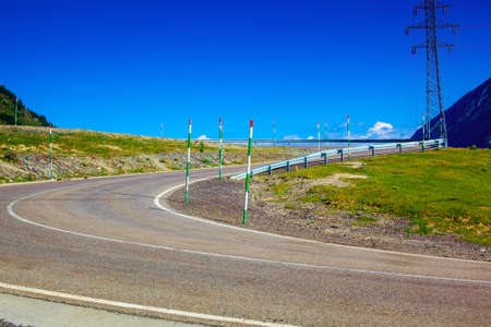 Road in high mountains at summer season.