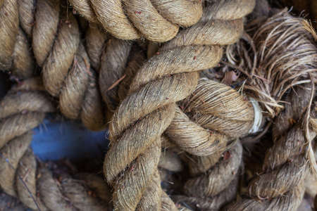 Thick old weathered rope closeup view.の写真素材