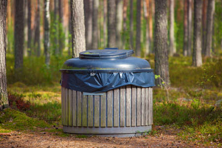 Big refuse bin in forest for tourists.の写真素材