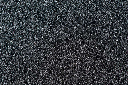Sandpaper surface super close-up view. Magnification about 100 times.の写真素材